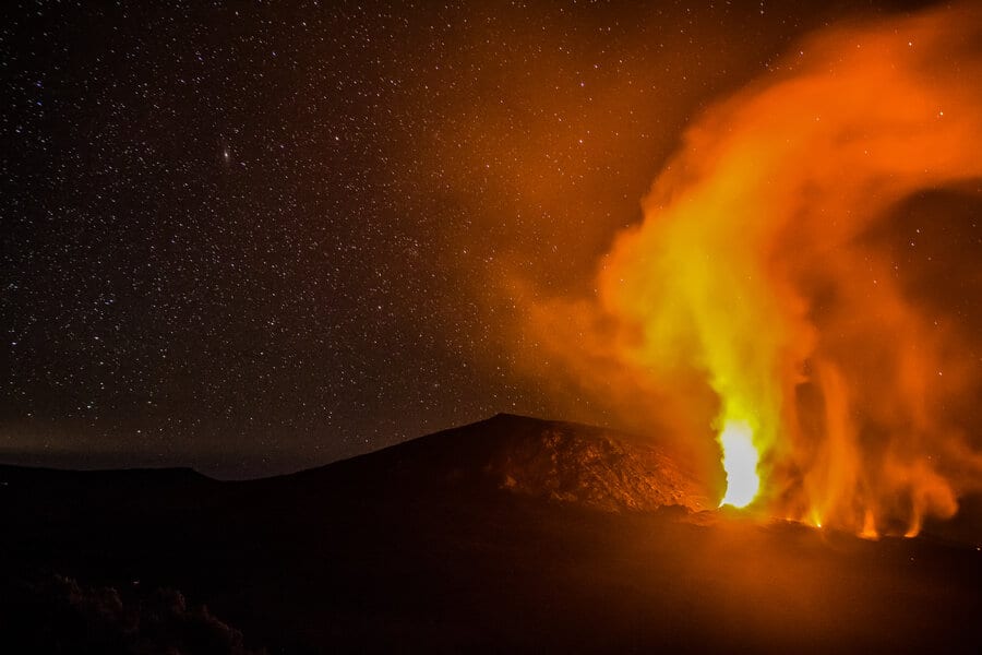 A fantastic eruption of Piton de la Fournaise against the night sky.