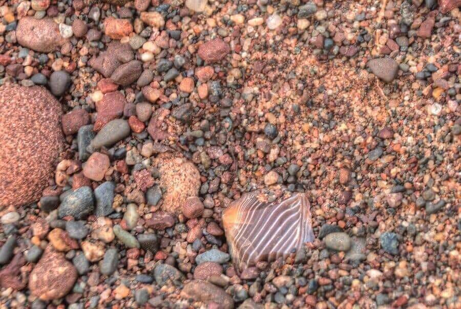 A gravel bed with an agate