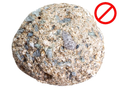 A rock with rough, granular texture, as an example of what kind of rocks are not good for tumbling.